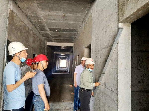 陕煤建设澄合分公司承建的曹家滩4#公寓楼工程一次性通过主体验收