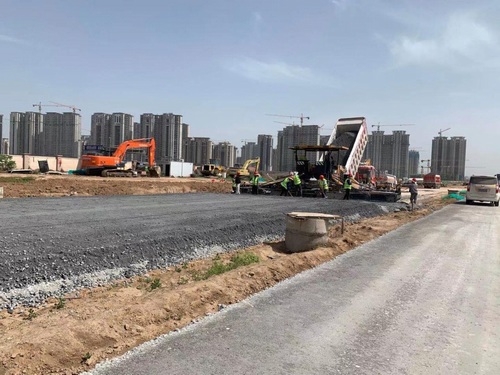 陕煤建设路桥分公司汉风五路项目部攻坚克难抢工期