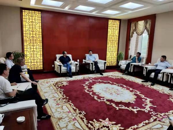 陕煤建设集团携中化矿山总局与准格尔旗人民政府开展合作交流洽谈