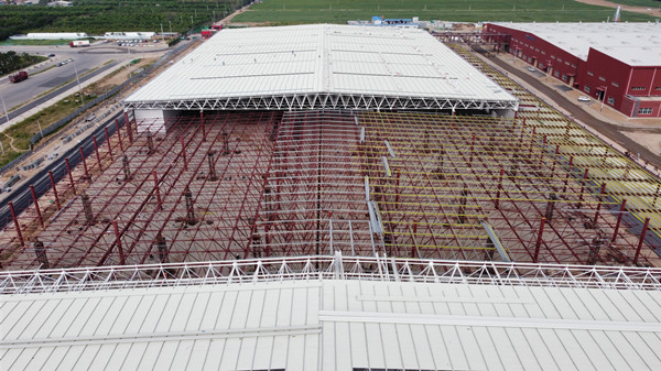 陕煤建设渭南分公司：南京金龙电动车项目网架顶升圆满收官